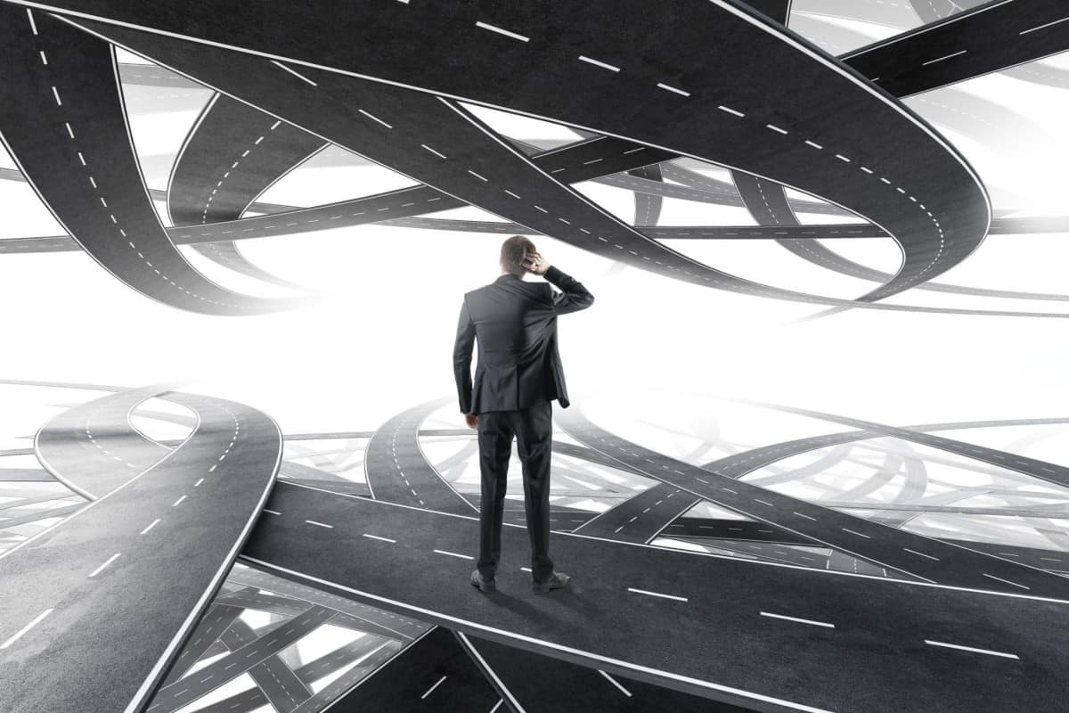 Person choosing between paths as a symbol of risk management