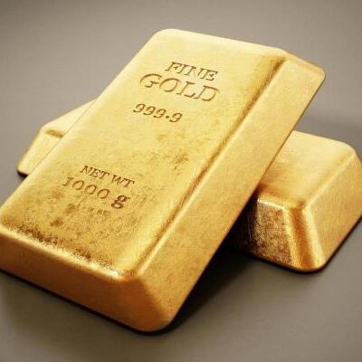 Learn everything about buying and selling gold. The image shows gold bars.