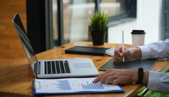 Notebook with a written trading plan on a desk